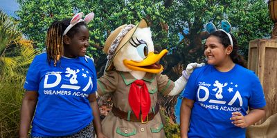 Disney Dreamers Academy students with Daisy Duck.